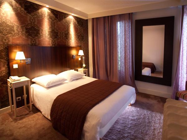 Hotel Les Negociants : photo 2 de la chambre chambre triple