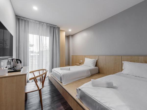 Hako Hotel Taman U : photo 3 de la chambre dual twin window