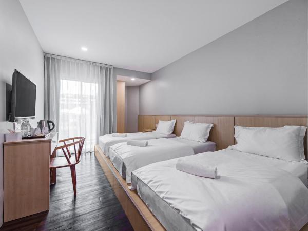 Hako Hotel Taman U : photo 2 de la chambre triple solo