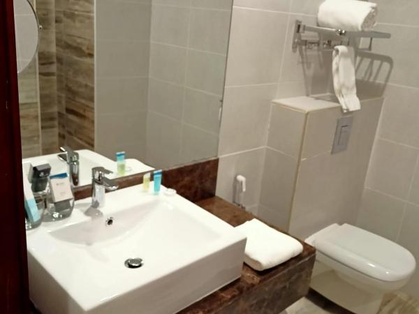 Grand Tourist Hotel : photo 5 de la chambre chambre double deluxe (2 adultes + 1 enfant)