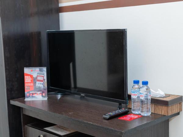 RedDoorz Syariah near Marvel City Mall 2 : photo 8 de la chambre chambre double