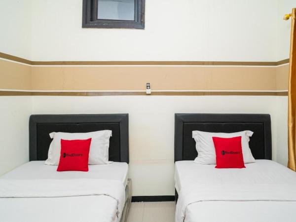 RedDoorz Syariah near Marvel City Mall 2 : photo 2 de la chambre chambre lits jumeaux