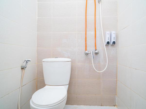 RedDoorz Syariah near Marvel City Mall 2 : photo 6 de la chambre chambre double Économique