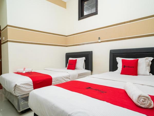 RedDoorz Syariah near Marvel City Mall 2 : photo 1 de la chambre chambre familiale