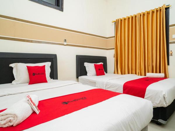 RedDoorz Syariah near Marvel City Mall 2 : photo 2 de la chambre chambre familiale