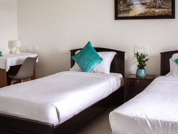 Catalyst Suites : photo 8 de la chambre chambre deluxe double ou lits jumeaux