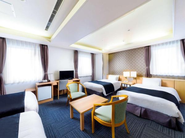 SureStay Plus Hotel by Best Western Shin-Osaka : photo 1 de la chambre chambre familiale avec 4 lits simples - non-fumeurs