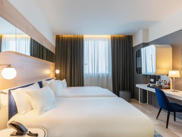 voco Milan-Fiere, an IHG Hotel : photo 4 de la chambre chambre lits jumeaux standard avec lit d'appoint