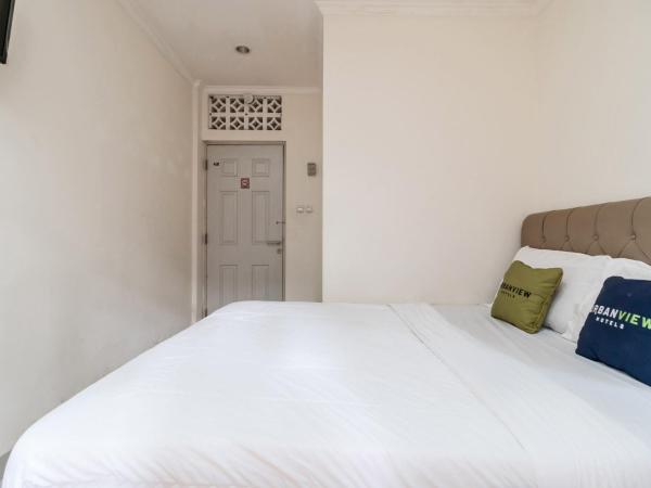 Urbanview Hotel Minongga Pondok Labu by RedDoorz : photo 3 de la chambre chambre double supérieure