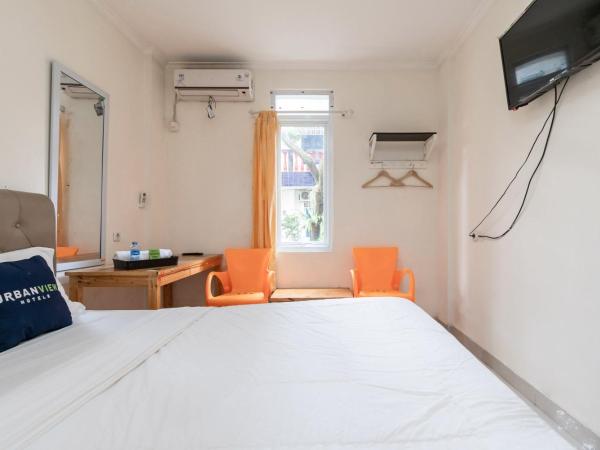Urbanview Hotel Minongga Pondok Labu by RedDoorz : photo 6 de la chambre chambre double supérieure