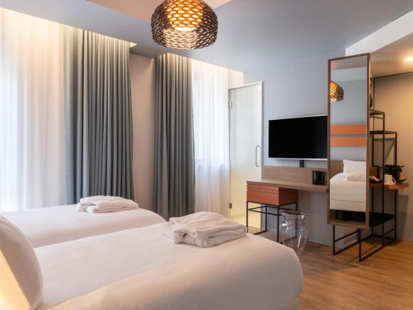 Golden Tulip Saint Malo– Le Grand Bé : photo 4 de la chambre chambre lits jumeaux deluxe