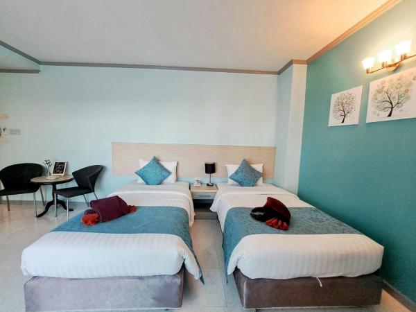 Thipurai City Hotel : photo 6 de la chambre chambre lits jumeaux deluxe