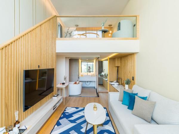 Mila Kohlarn มิ-ลา เกาะล้าน : photo 1 de la chambre chambre triple exécutive