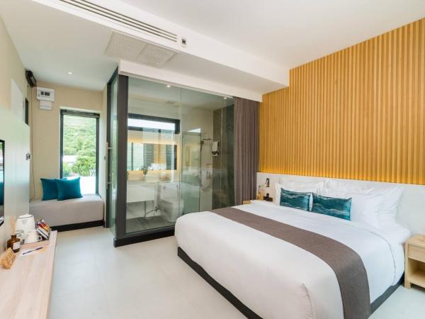 Mila Kohlarn มิ-ลา เกาะล้าน : photo 6 de la chambre chambre lit king-size deluxe