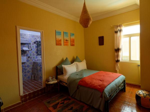 Riad Parfums de OUARZAZATE : photo 6 de la chambre chambre deluxe