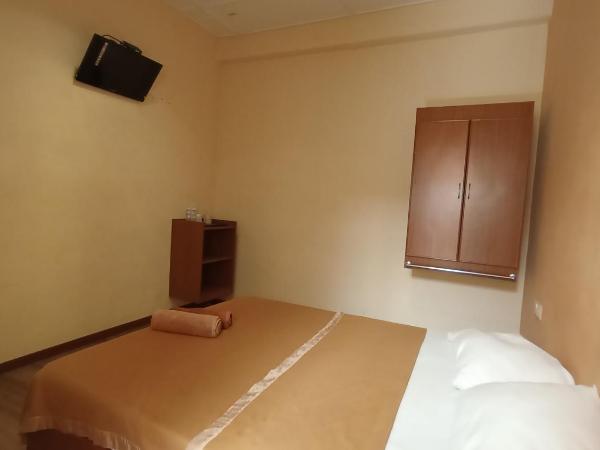 Straits Settlement Inn : photo 3 de la chambre chambre double standard