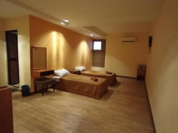 Straits Settlement Inn : photo 3 de la chambre chambre lits jumeaux deluxe