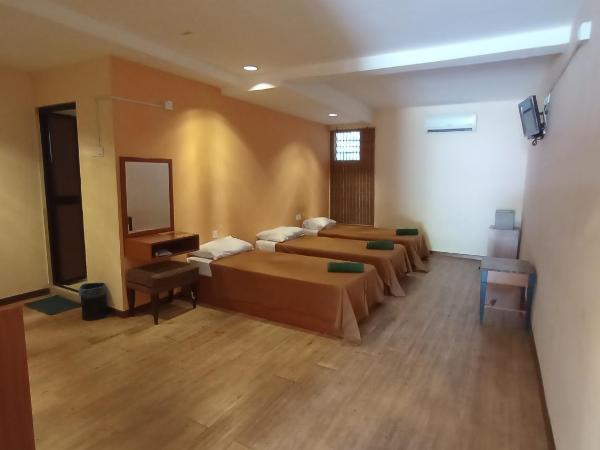 Straits Settlement Inn : photo 3 de la chambre chambre triple deluxe