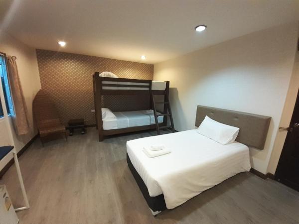 Parasol Inn Chiang Mai Old City Hotel - SHA Plus : photo 1 de la chambre chambre familiale