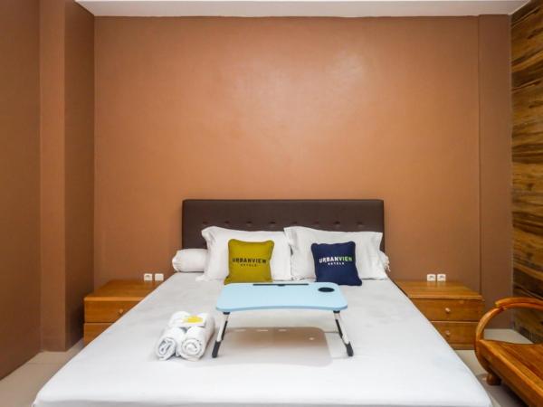 Urbanview Hotel Blok O International by RedDoorz : photo 4 de la chambre chambre deluxe
