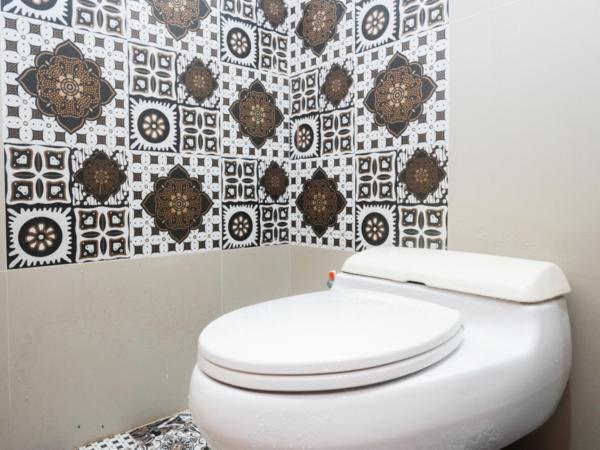 Urbanview Hotel Blok O International by RedDoorz : photo 3 de la chambre chambre deluxe