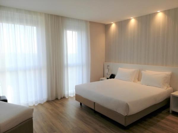 Novo Hotel Rossi : photo 4 de la chambre chambre quadruple