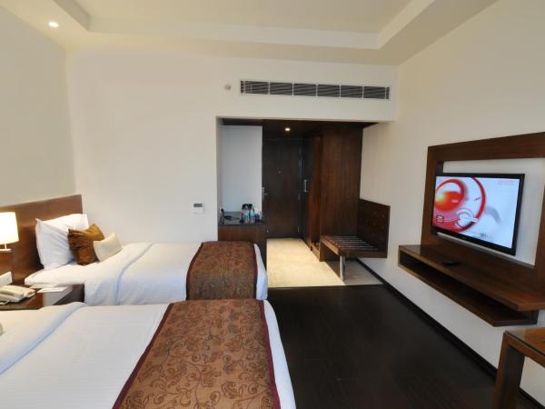 Hotel Marigold Jaipur : photo 1 de la chambre chambre deluxe double ou lits jumeaux