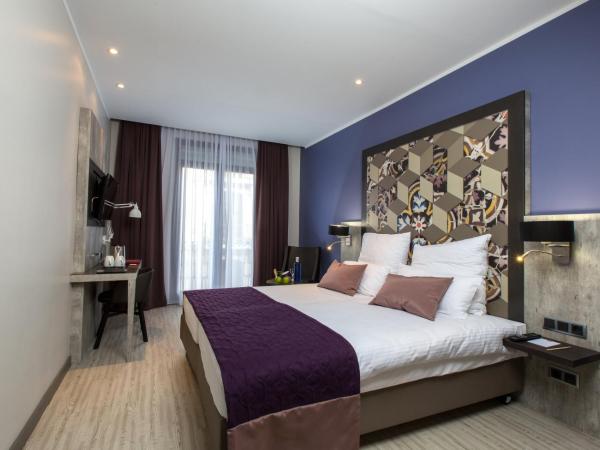Leonardo Hotel Barcelona Las Ramblas : photo 10 de la chambre chambre double ou lits jumeaux supérieure