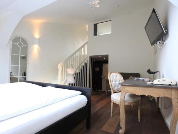 Altstadthotel Kasererbräu : photo 6 de la chambre suite avec vue sur la forteresse