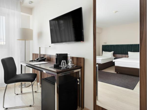 Hotel Moderno Poznań : photo 5 de la chambre chambre lits jumeaux supérieure