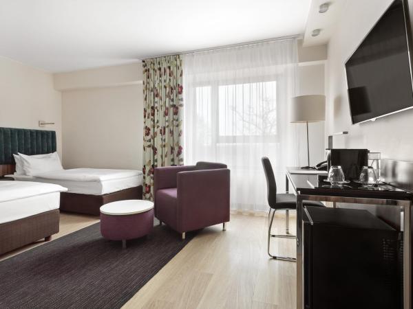 Hotel Moderno Poznań : photo 1 de la chambre chambre lits jumeaux supérieure