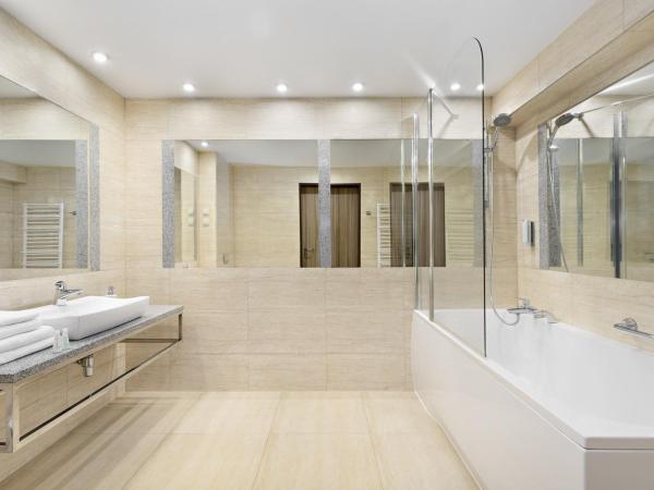 Hotel Moderno Poznań : photo 2 de la chambre studio lit king-size