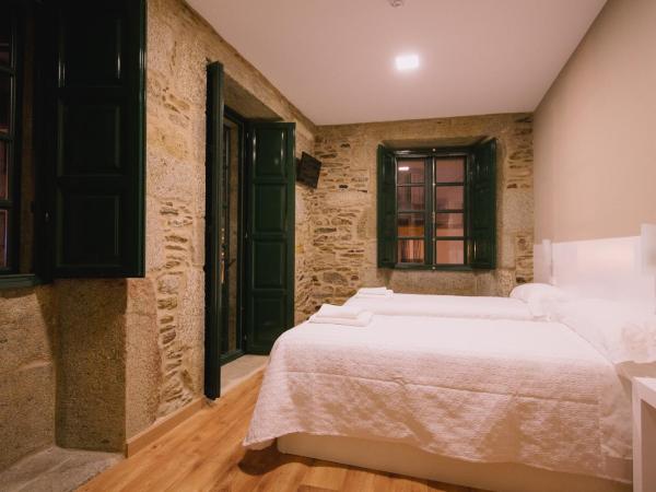 Hospederia Tarela : photo 1 de la chambre chambre lits jumeaux