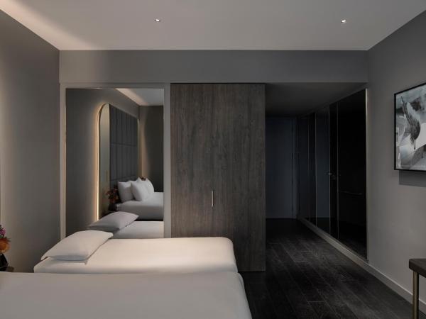 AMANO Covent Garden : photo 7 de la chambre chambre triple