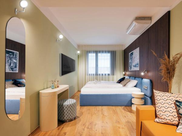 The Magazine Rooms : photo 1 de la chambre chambre quadruple supérieure