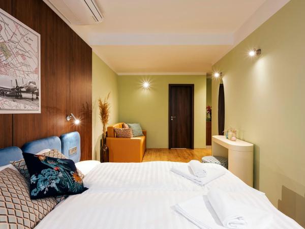 The Magazine Rooms : photo 3 de la chambre chambre quadruple supérieure