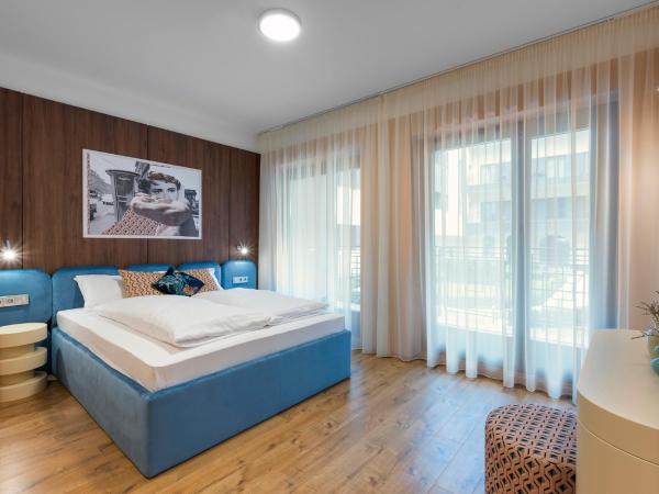 The Magazine Rooms : photo 1 de la chambre chambre double avec balcon