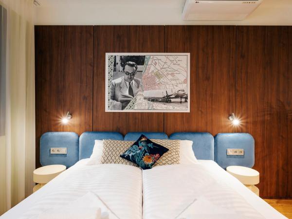 The Magazine Rooms : photo 2 de la chambre chambre quadruple supérieure