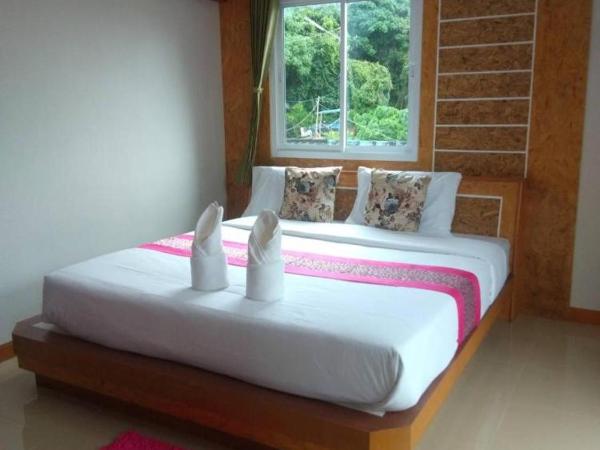 khlongthop minimart : photo 5 de la chambre appartement - vue sur jardin