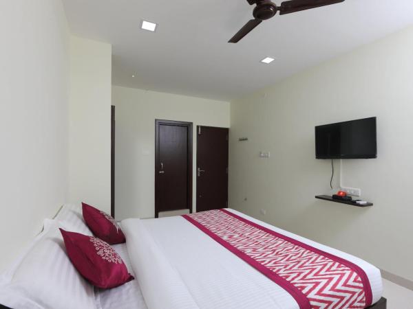 Super OYO Flagship Perfect Stay Near Meenambakkam Metro Station : photo 9 de la chambre chambre double ou lits jumeaux standard