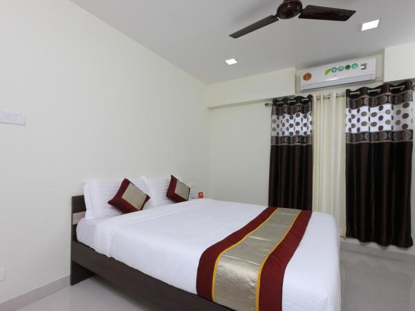 Super OYO Flagship Perfect Stay Near Meenambakkam Metro Station : photo 1 de la chambre chambre double ou lits jumeaux standard