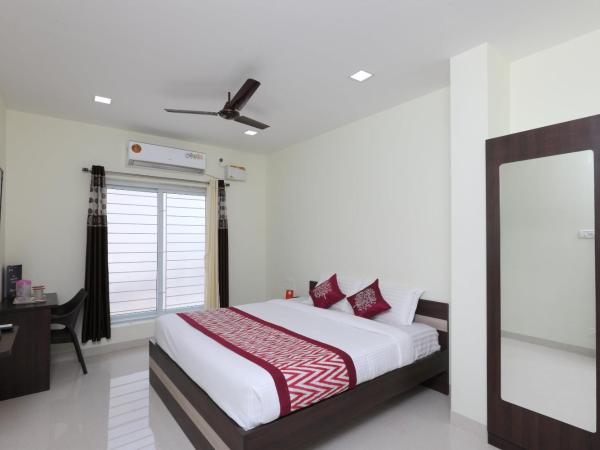 Super OYO Flagship Perfect Stay Near Meenambakkam Metro Station : photo 2 de la chambre chambre double ou lits jumeaux standard