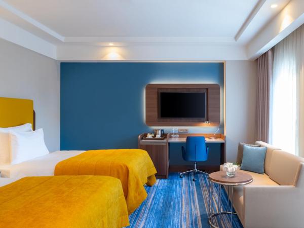 Mövenpick Hotel Istanbul Asia Airport : photo 1 de la chambre chambres familiales communicantes