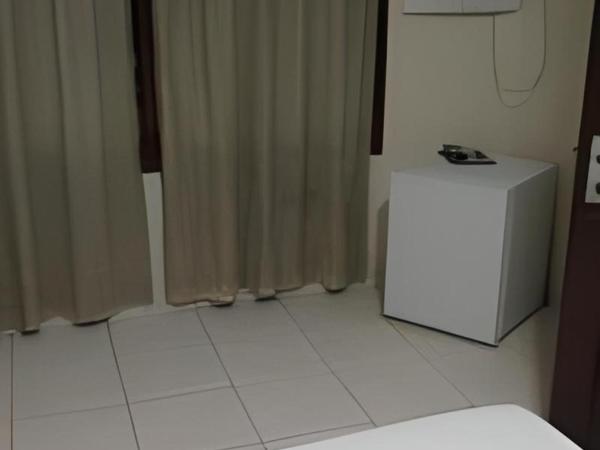 Hotel Tubarão : photo 1 de la chambre chambre quadruple