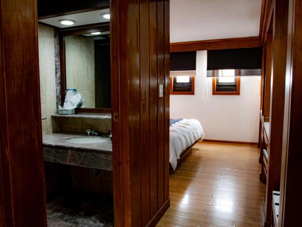 Hotel Contadero Suites y Villas : photo 4 de la chambre chambre lit king-size