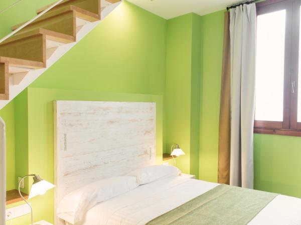 Ad Hoc Carmen : photo 3 de la chambre chambre familiale avec terrasse