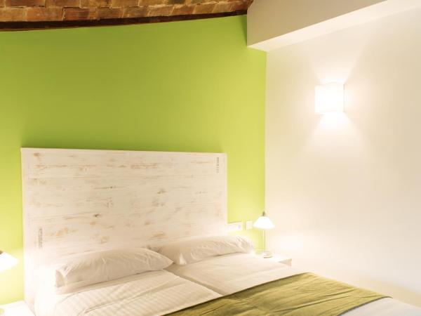 Ad Hoc Carmen : photo 8 de la chambre chambre familiale avec terrasse