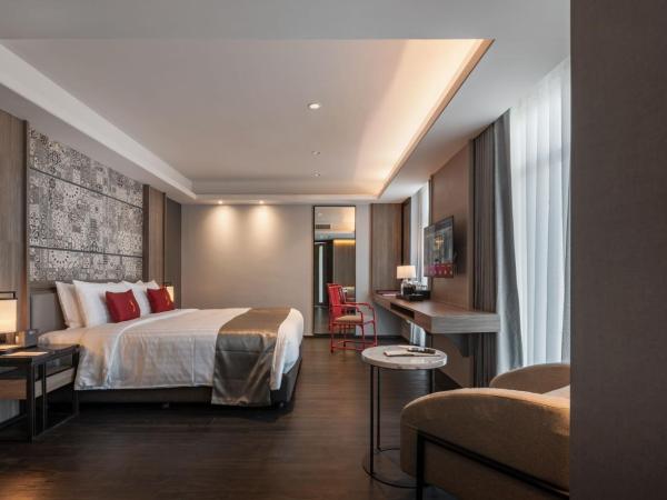 Ramada Plaza by Wyndham Chao Fah Phuket : photo 10 de la chambre chambre lit king-size premium