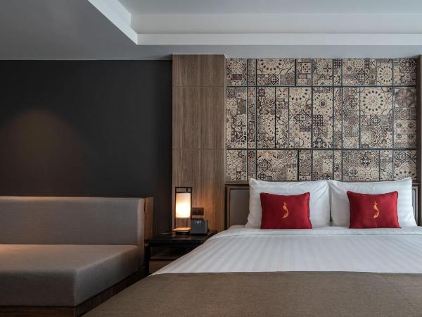 Ramada Plaza by Wyndham Chao Fah Phuket : photo 6 de la chambre suite junior lit king-size