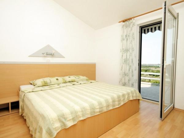 Apartments and rooms with a swimming pool Babici, Umag - 3046 : photo 4 de la chambre appartement 2 chambres avec terrasse et vue sur la mer